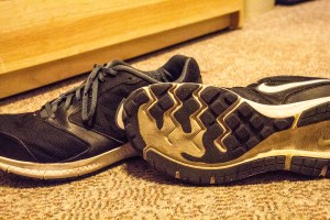 a close up of worn out tennis shoes.